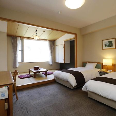 Yuyado Kuttari Onsen Lake Inn Shintoku Buitenkant foto